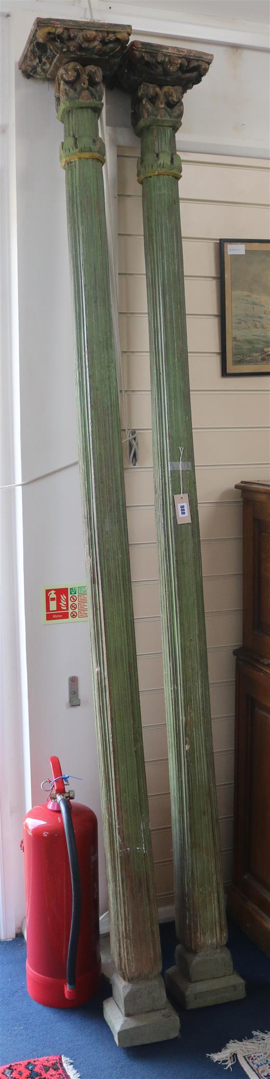A pair of green painted carved wood classical pillars H.233cm